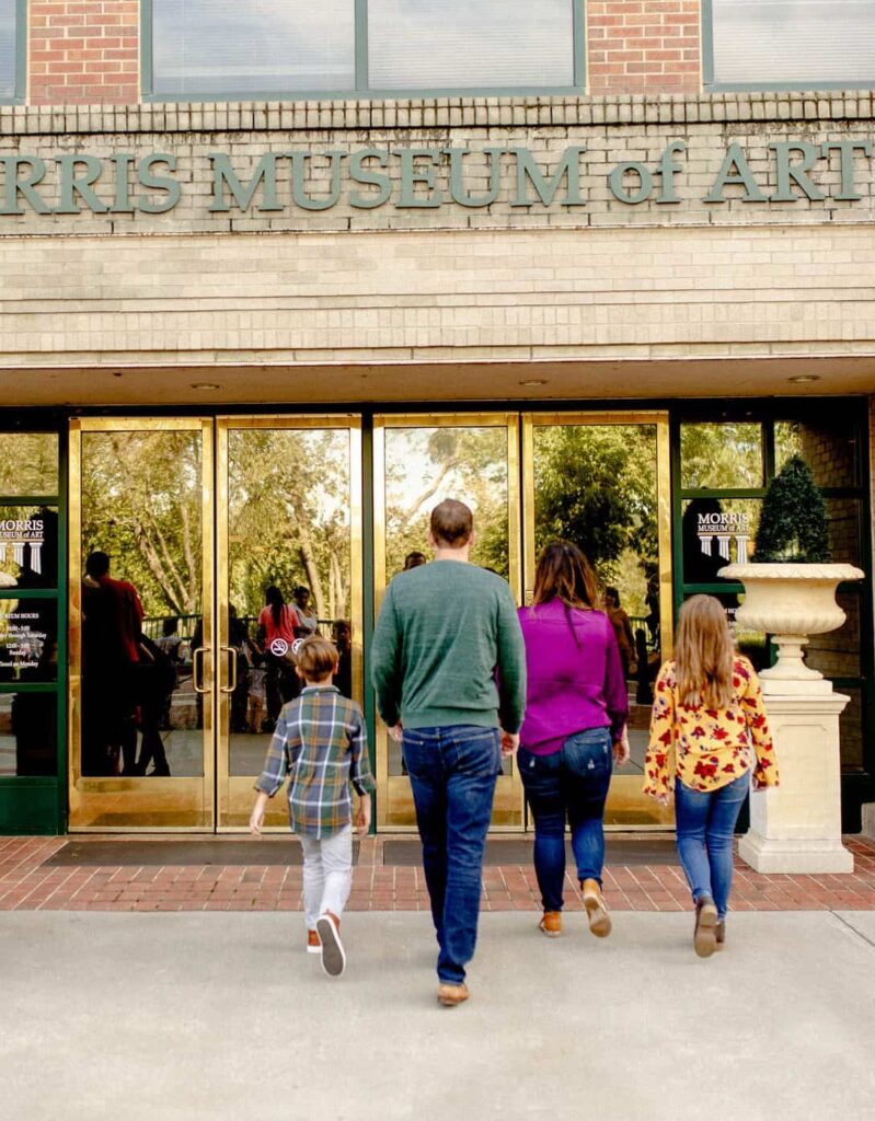 picture of family walking in museum