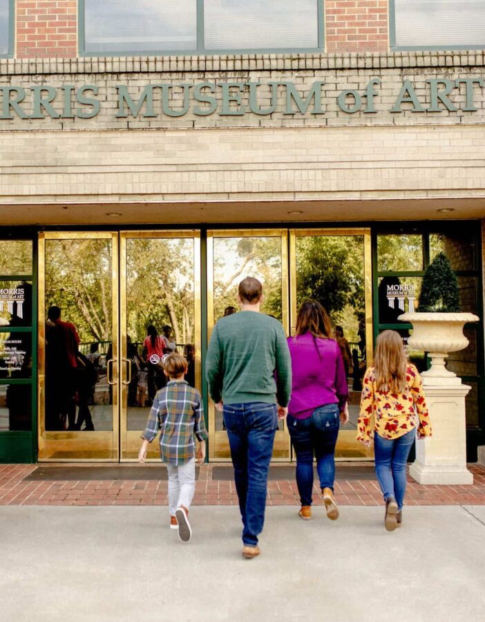 picture of family walking in museum