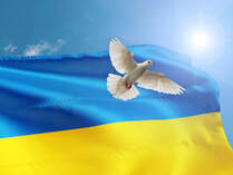 picture of a dove and Ukraine flag